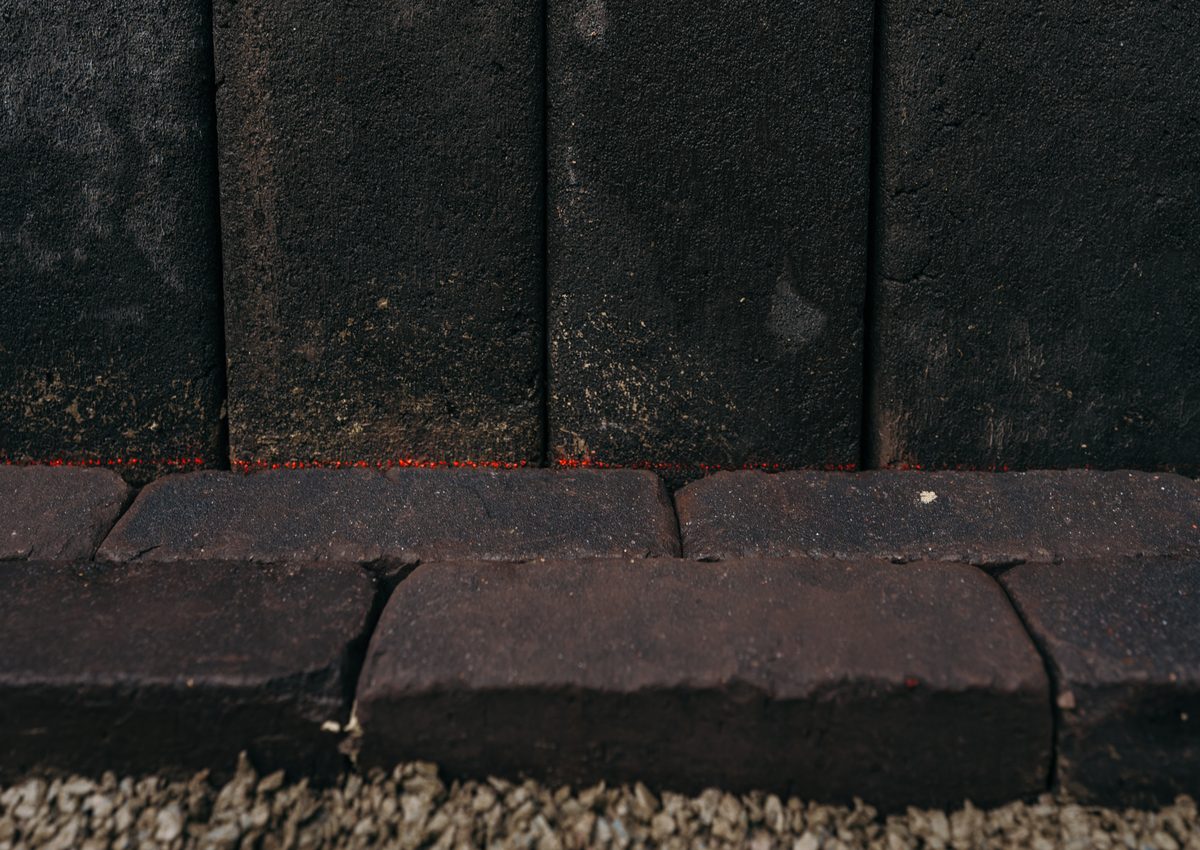 Pflasterarbeiten mit Betonstein-Palisaden und Klinker-Einfassung